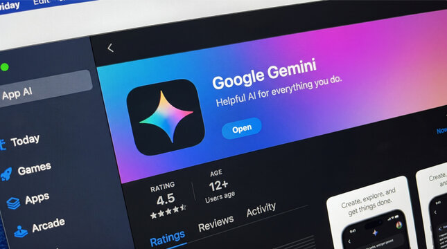 Closeup of a computer monitor screen displaying the Google Gemini artificial intelligence app store page with its colorful logo, rating, and interface for advanced AI assistant technology software