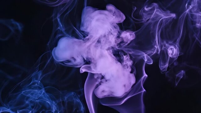 Purple and Blue Smoke Swirling on Black Background