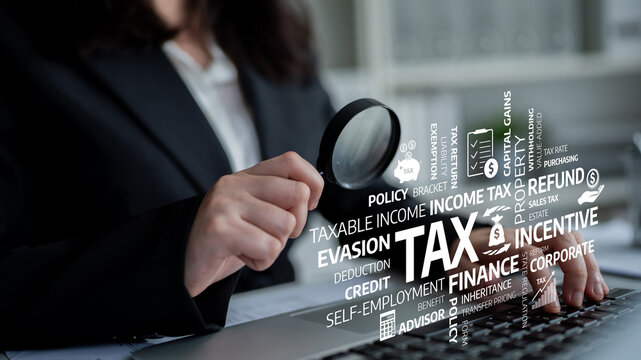 A business professional uses a magnifying glass to examine tax terminology, showcasing concepts related to finance, corporate taxation, and accounting analysis. Tessel