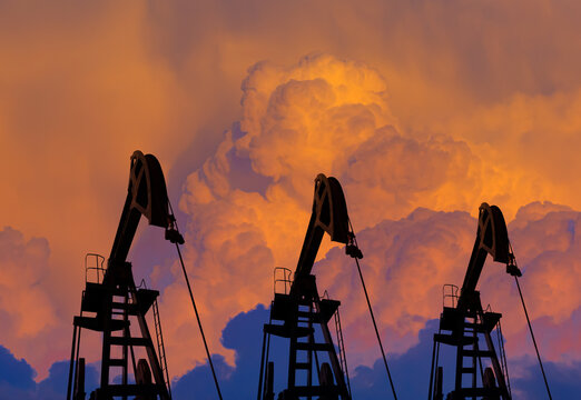 Smoke and flames engulfing the oil pump or donkey pump - Oil pumps. Oil industry equipment.