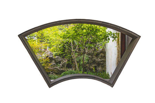Details of Chinese classic garten architecture art - a paper fanl shape window frame on the wall to revail the garten plants and rocks