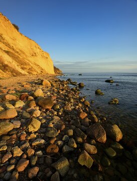 Cliffs and boulders on the coast of the Baltic Sea in the evening light, Reddevitzer H&ouml;ft, M&ouml;nchgut peninsula, R&uuml;gen island, Mecklenburg-Western Pomerania, Germany