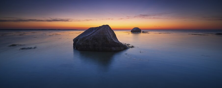 Panorama, sandy beach with large boulders at sunset, Wismar Bay, Wismar, Mecklenburg-Western Pomerania, Germany