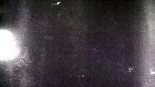 Vintage Super 8 film frame overlay with retro texture, dust, scratches, and grain effect for cinematic video editing and nostalgic aesthetic overlays.