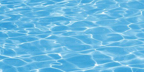 Obraz premium The ripples of small waves of blue and white water are dynamic yet still appear smooth, creating naturally repeating abstract patterns.