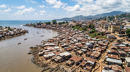 Old town Freetown Sierra Leone. Coast of west Africa. Flying over slums beside the river. © pinan