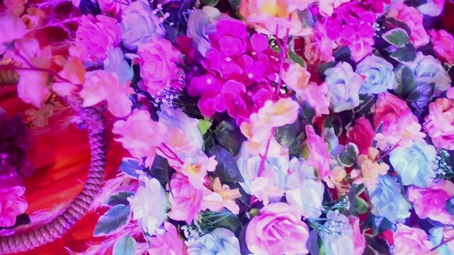 The vibrant floral setup represents traditional Indian wedding celebrations, marriage ceremonies, reception events, cultural festivities, event planning, luxury decoration, and romantic occasions.