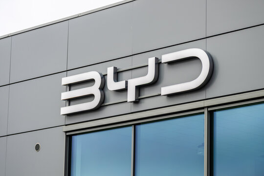 Gothenburg, Sweden - March 15 2026: Modern BYD electric vehicle brand logo mounted on contemporary commercial building facade.