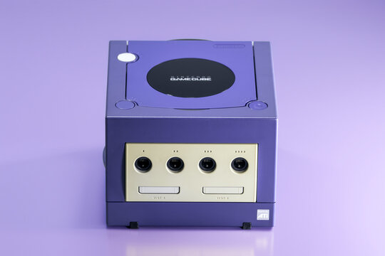 Fukuoka, Japan. June 6, 2026: Front view of an indigo Nintendo GameCube console showing controller ports and memory card slots in a retro gaming product photograph.