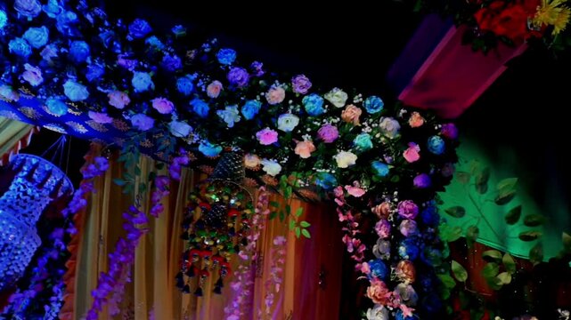 Colorful Floral Wedding Decoration Background with Marigold Garlands and Stage Setup for Indian Marriage Ceremony, Colorful floral decorations and marigold garlands arranged for an Indian wedding
