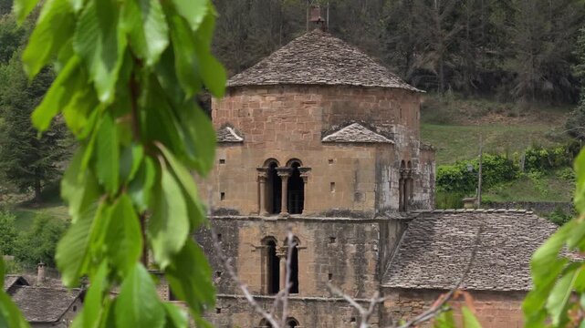 Ancient Stone Monastery Framed by Misty Mountain Forest