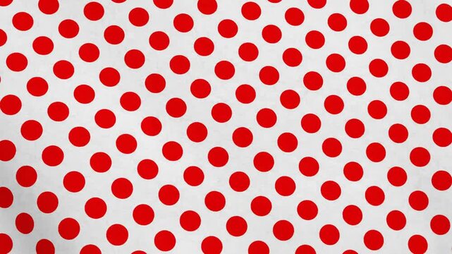 Abstract pattern of red dots on white background with dynamic rotation and movement