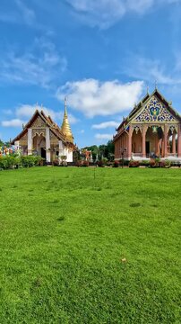 Wat Phra That Chang Kham Worawihan .The temple is located in the heart of Nan Thailand . Inside the chapel, the atmosphere is quiet and magical : Pan left Footage