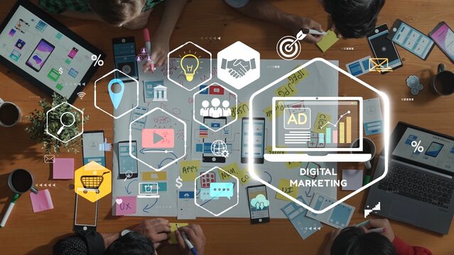 A vibrant workspace showcasing a team collaborating on a digital marketing strategy. The scene features charts, sticky notes, and technology visuals, symbolizing innovation. Raster