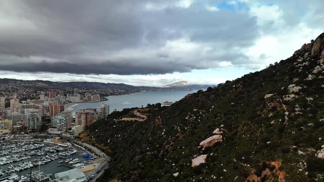 Aerial drone view of Penon de Ifach rock and Calpe skyline, Spain