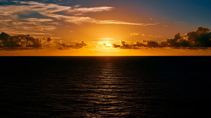 Obraz premium Golden sunset serenity ocean cruise ship deck tranquil water reflects peaceful sky calm sea vista