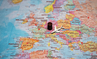Naklejka premium Airplane and fuel barrel on a map of Europe.