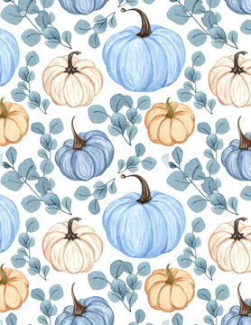 Watercolor seamless pattern with blue and cream pumpkins and eucalyptus leaves on white background
