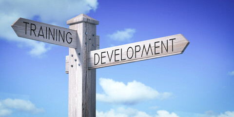 Fototapeta premium Training and Development - Wooden Signpost with Two Arrows