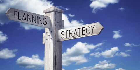 Obraz premium Planning and Strategy - Wooden Signpost with Two Arrows