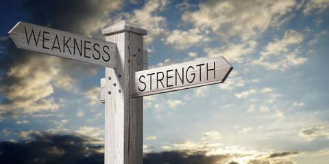 Fototapeta premium Weakness and Strength - Wooden Signpost with Two Arrows