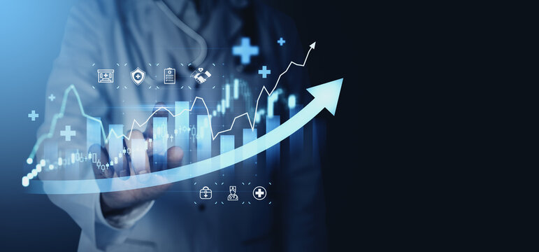 Medical business growth chart with doctor hand analyzing rising financial graph and healthcare icons on blue background concept.