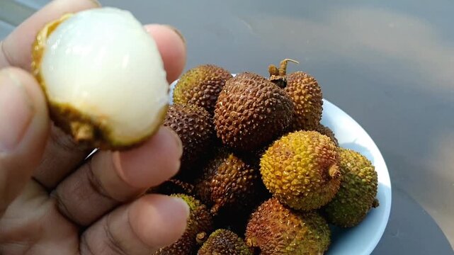 Studio shot of juicy honey lychee fruit with water drops for product mockup