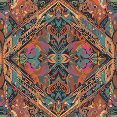 Obraz premium Vibrant, intricate paisley and geometric pattern design for textile use. Colorful, symmetrical design with detailed floral and paisley motifs arranged in a geometric structure.