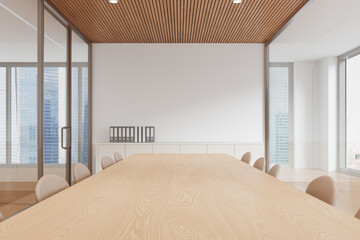 Naklejka premium Modern conference room interior featuring long wooden table, elegant seating, glass partitions and urban skyline view in bright minimalist workspace. 3D Rendering