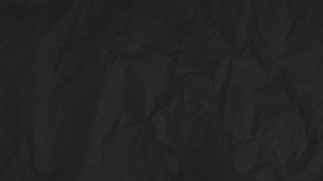 Abstract Black Crumpled Paper Texture Background &ndash; Seamless Loop Motion Video