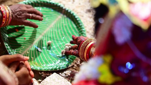 Bride and Groom Hands During Traditional Hindu Wedding Ceremony Performing Sacred Marriage Rituals in India. Ideal for wedding, relationship, religion, family, celebration, and Indian cultural themes.