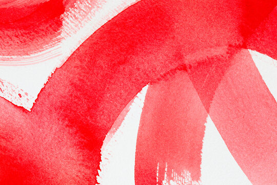 Bold red paint textures on white paper