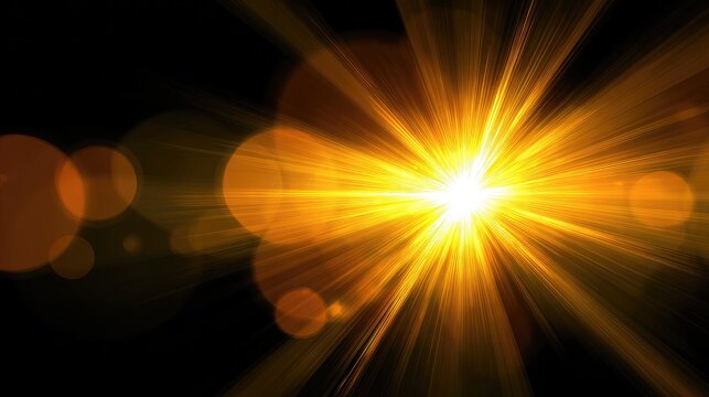Brilliant golden light burst with lens flare on black background