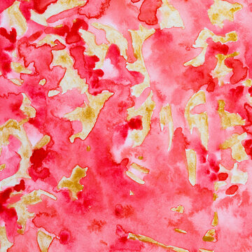 Gold color and red patterns painted on paper