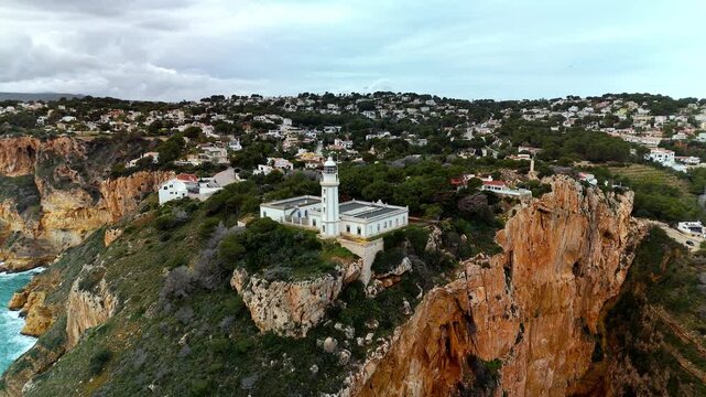 Aerial lighthouse boomerang shot at Cap de la Nau, Costa Blanca, Spain