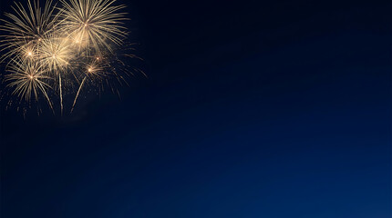 Fototapeta premium Golden Fireworks Exploding Against a Deep Blue Night Sky for New Year Celebration Background