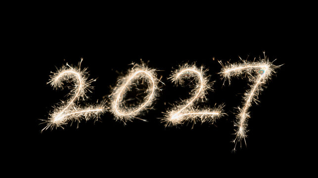 sparkler 2027 new year number glows in dark night background during festive silvester celebration with golden light trail