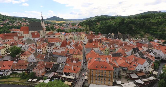 4k right to left panning motion of the UNESCO World Heritage Site of the historic town Center of Cesky Krumlov. Situated on the banks of the Vltava river, the town was built around a 13th-century