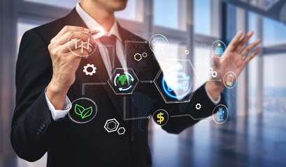 Obraz premium Professional business person using holographic interface technology to represent innovation, sustainability, and finance in modern corporate environment. Entropy.