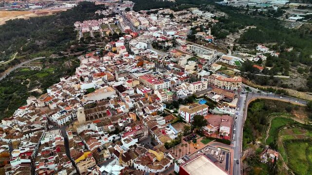 Aerial drone orbit over La Nucia town near Polop, Costa Blanca, Spain