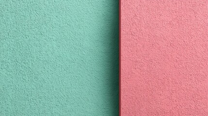 Fototapeta premium A close-up image of a textured wall with two distinct color sections, turquoise on the left and pink on the right, separated by a vertical line, abstract color combo background