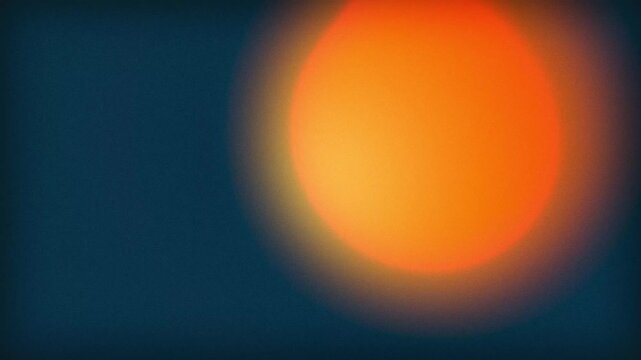Abstract animation of a glowing orange sun sphere on dark blue background