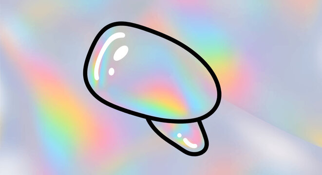 Rainbow colored soap bubble floating freely.