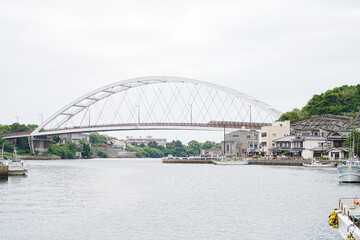 Fototapeta premium Gonoura Ohashi Bridge Scenic Landscape in Iki Island, Nagasaki, Japan - 日本 長崎県 壱岐市 ランドマーク 郷ノ浦大橋と青い海