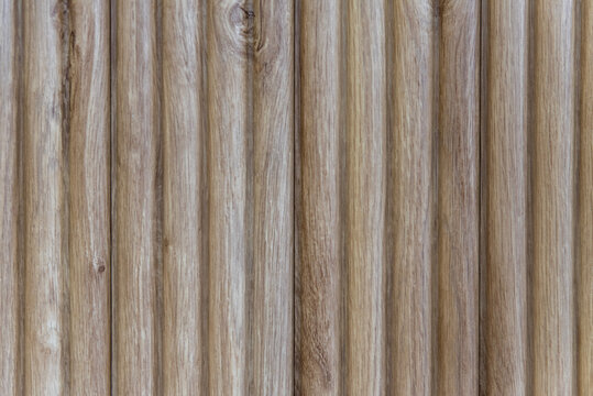 Natural oak fluted wall panel surface with vertical slats