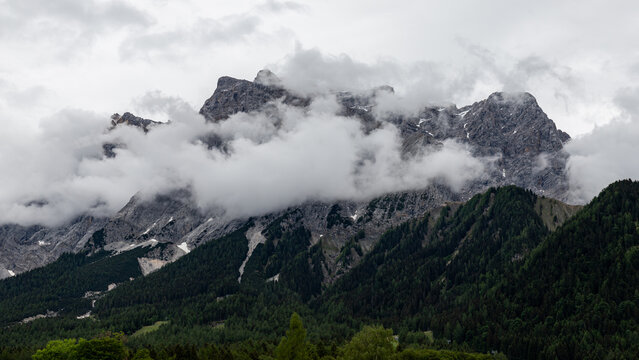 Misty Tyrolean Alps Mountain Peaks Under Low Clouds