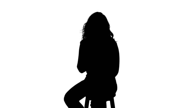 Silhouette of a person sitting with legs crossed on a chair isolated on transparent background, Vector