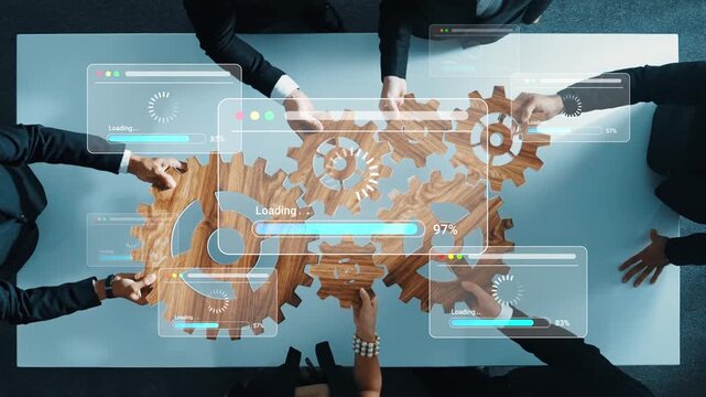 Collaborative Teamwork with Digital Interface Showing Gears and Progress Bars for Project Management and Workflow Optimization in Modern Work Environment Gluon.