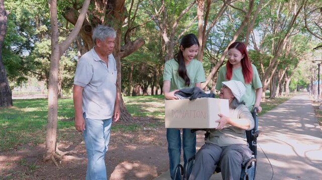 Caring Hands in the Park: A heartwarming scene unfolds as a multigenerational group comes together in a park, showing empathy and providing assistance and care for the elderly. A gentle.