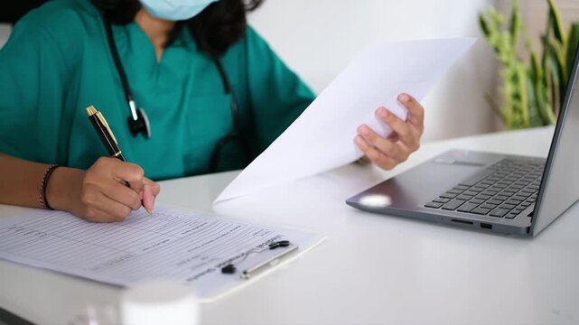 Person, dokter, nurse and hands writing with document for medical prescription, patient records or inusrance at hospital. closeup or doctor with notes or filling health form, survey or application
